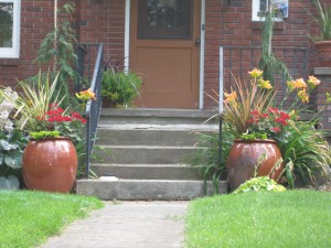 Handsome Pots Framing a Home's Entry